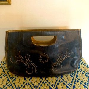 Christopher K navy bag.